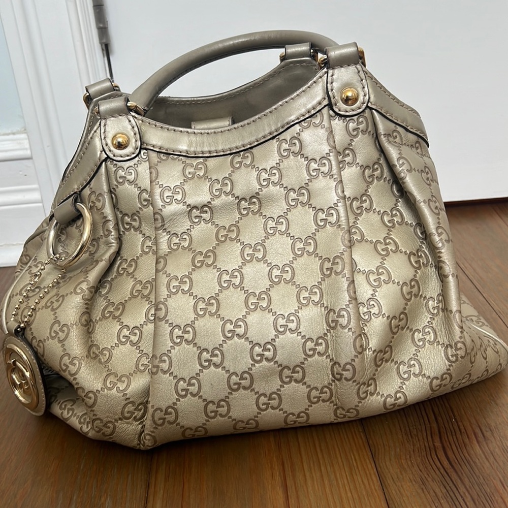 Sukey Gucci embossed gold leather tote